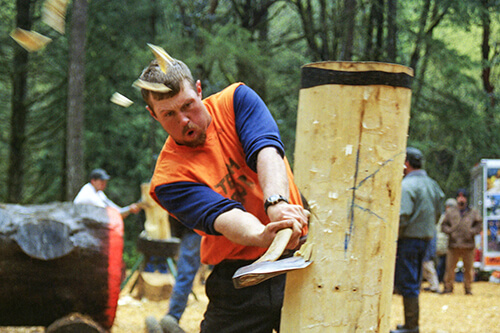 Woodsman Team co-captain Dan Marvin powers through his block during the hard hit competition.