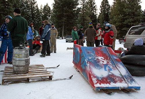 The University of Montana Woodsman Team and Forestry Club gather for their annual Winter Olympics Skitching Party.